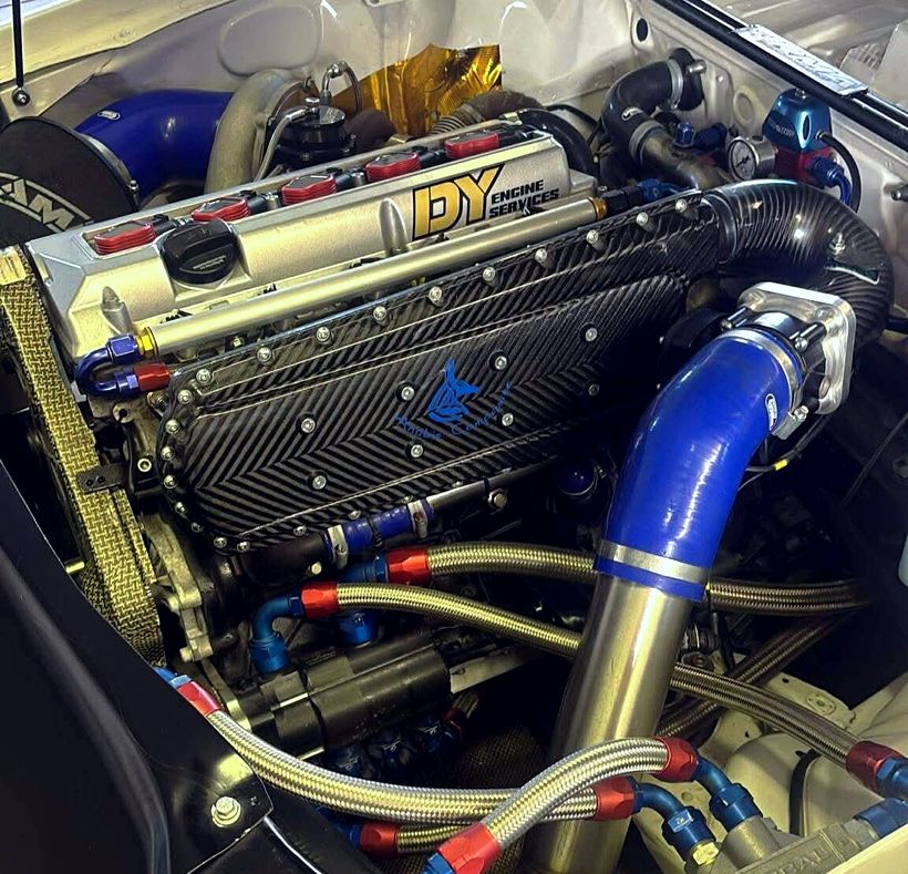 Anubis Composite carbon fiber intake manifold on a turbocharged five-cylinder race engine.